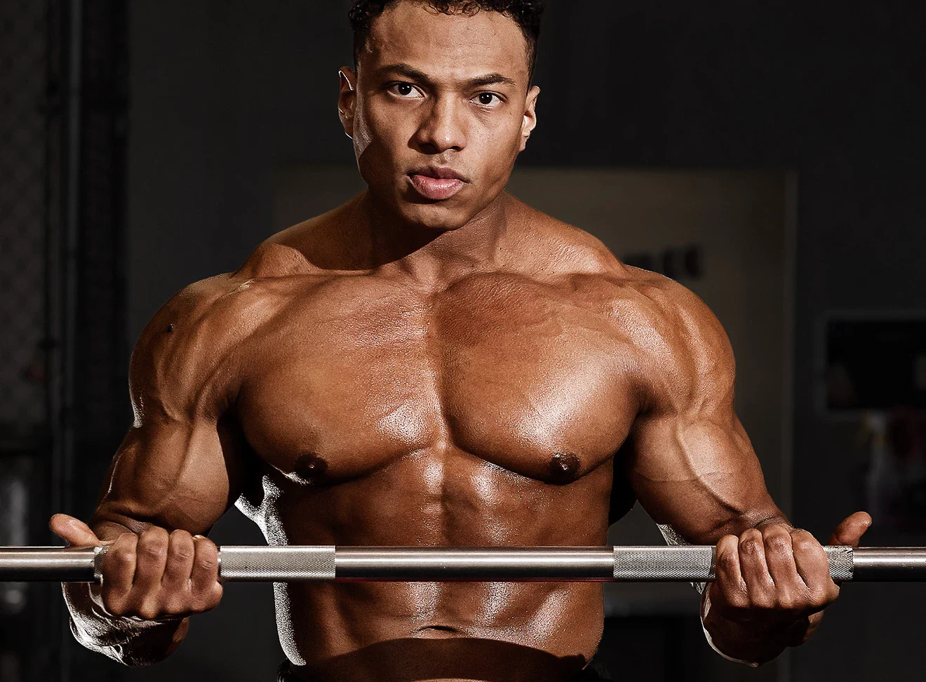 atleta-integralmedica-treino-alta-performance-com-barra